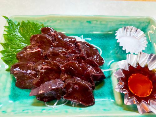 Raw horse liver sashimi