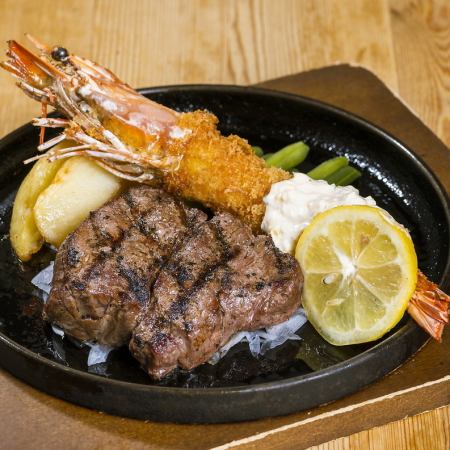 Angus steak and hand-prepared fried shrimp with head
