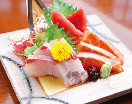 Assortment of three fresh fish sashimi