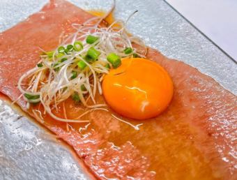 Grilled marbled wagyu beef shabu wrapped in egg yolk soy sauce