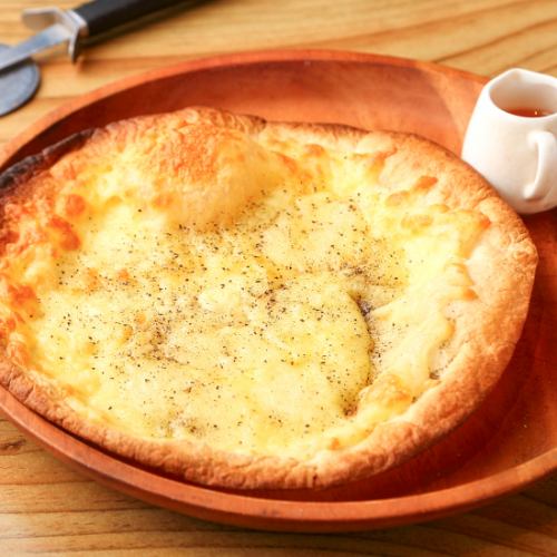 4 kinds of cheese and honey pizza