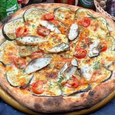 Homemade smoked mackerel and autumn eggplant pizza with tomato sauce