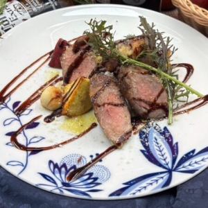 Herb-roasted Iberian pork shoulder with sweet potato sticks