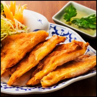 Gunga Buan (wrapped deep-fried shrimp paste)