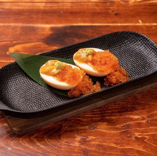 [Kitamurasaki sea urchin] Boiled egg topped with rich sea urchin