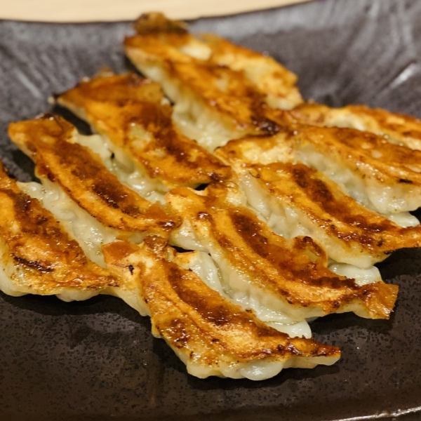 Handmade every day! Our specialty fried gyoza! You can choose with or without garlic, but we recommend the grilled gyoza with lots of garlic and chili peppers.