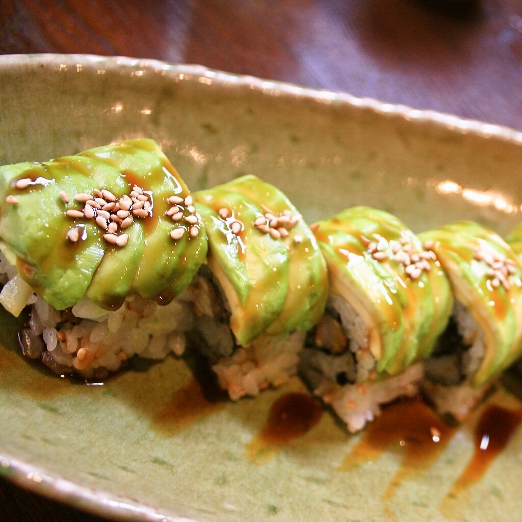The classic dragon roll goes great with avocado and sweet sauce!