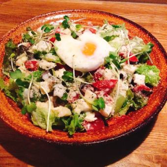 Caesar salad with soft-boiled egg and three kinds of cheese