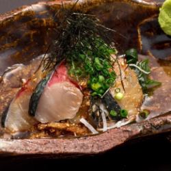 * Live mackerel with sesame seeds