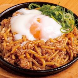 Teppan soba rice topped with a soft-boiled egg