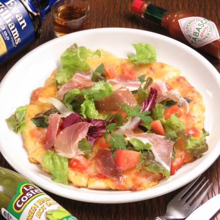 Prosciutto ham and tomato salad pizza