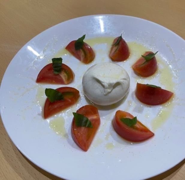 Fruit tomatoes and burrata cheese