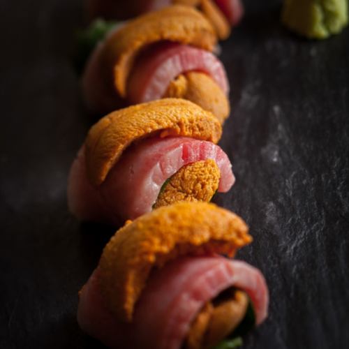 Luxurious roll of premium raw sea urchin and Murakami beef