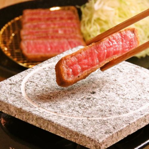 Beef cutlet on a stone plate