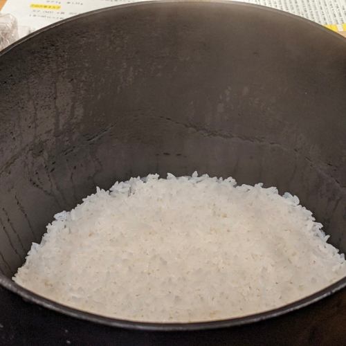 Rice cooked on an iron plate