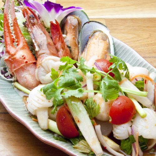 Seafood spicy herb salad “Yum Ruammi Talay”