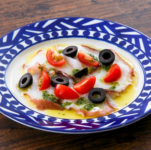 Octopus carpaccio (basil sauce)