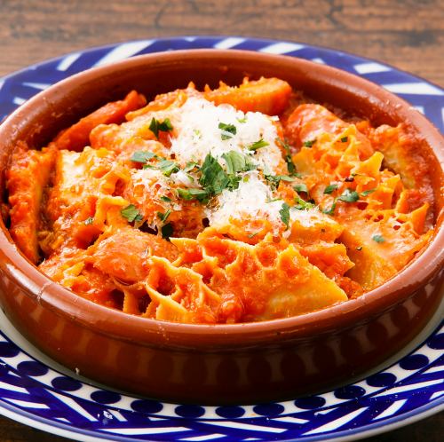 Beef tripe and chorizo stewed in tomato sauce