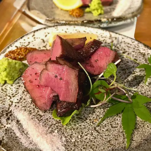 Thick-cut beef tongue grilled over charcoal