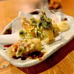 Chikuwa (fish cake) wrapped in seaweed / pickled ginger / mozzarella cheese / bamboo shoots