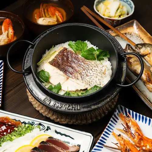 Sea bream rice cooked in a Nambu iron pot