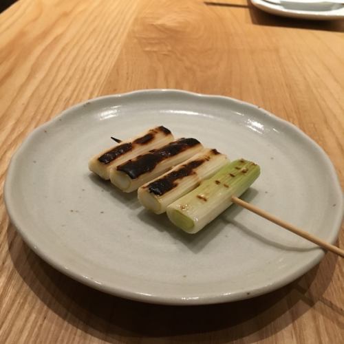 Grilled green onion skewers / grilled shishito skewers