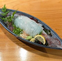 Live squid sashimi