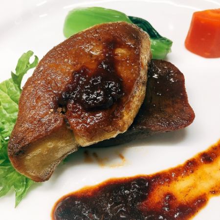 A luxurious dinner course featuring the world's best foie gras and tender juicy beef fillet steak.
