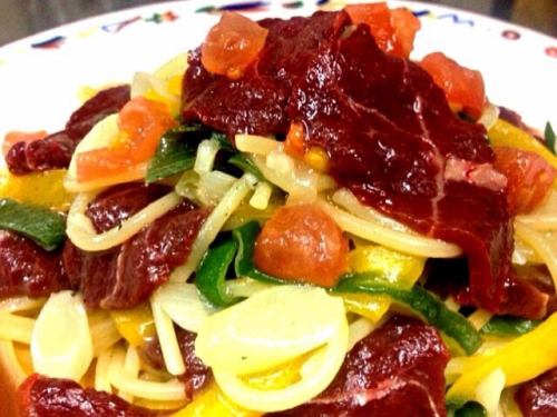 Spaghetti with horse meat from Aso Kumamoto and yellow and green peppers