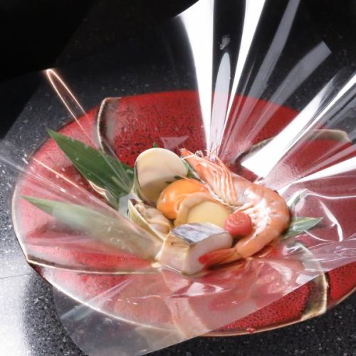 Steamed seafood in sake