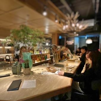 A bar counter decorated with natural marble from Sicily, Italy.
