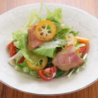 Duck and kumquat salad