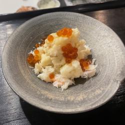 Potato salad with crab and salmon roe