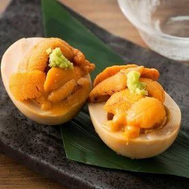 Boiled egg topped with Sanriku sea urchin