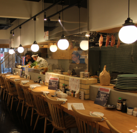 It is a seat at the counter in the open kitchen.