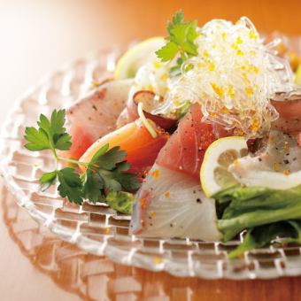Seafood carpaccio with salad