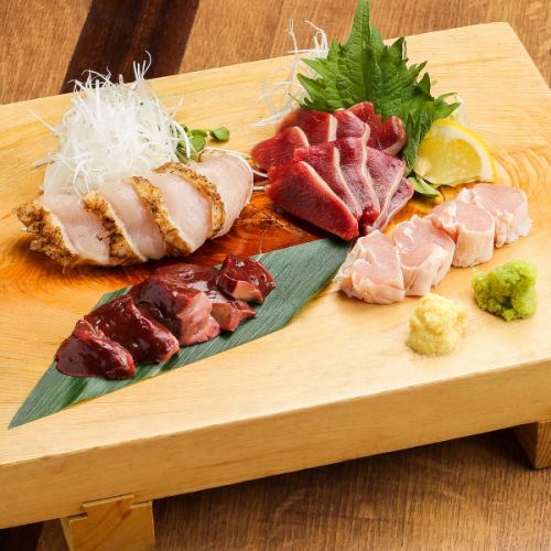 Assortment of 4 pieces of toriaburi sashimi