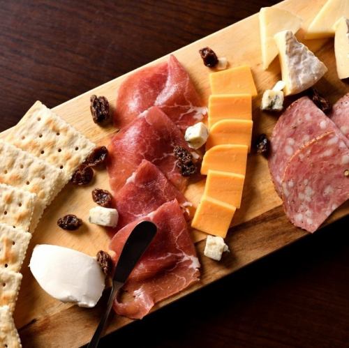 Charcuterie board (cheese and prosciutto platter)