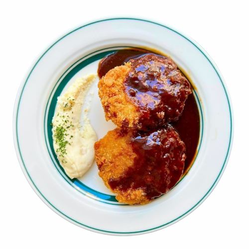 Homemade minced meat cutlet with demi-glace sauce