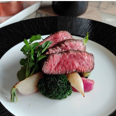 Premium black wagyu beef steak cooked on lava stones