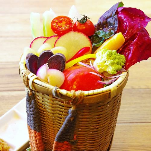 Assorted raw vegetables in the back basket