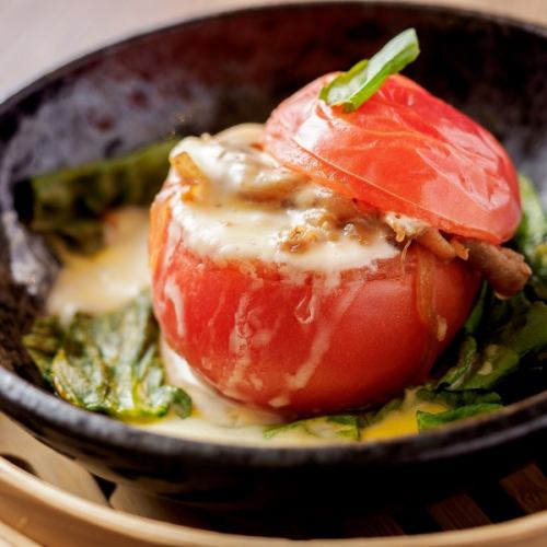Steamed whole tomato and pork with cheese