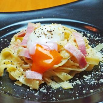 Carbonara with rich sauce, cheese and hot spring egg