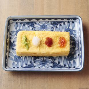 Fluffy egg roll topped with salmon roe