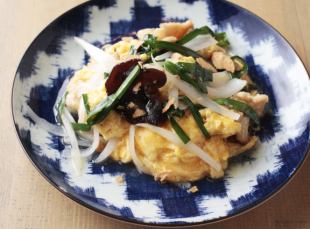 Fried pork and egg with garlic chips