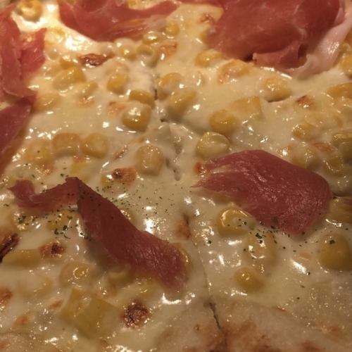 Miso-marinated mozzarella cheese and prosciutto pizza