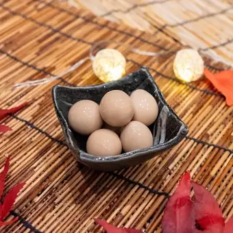 Quail eggs marinated in sauce