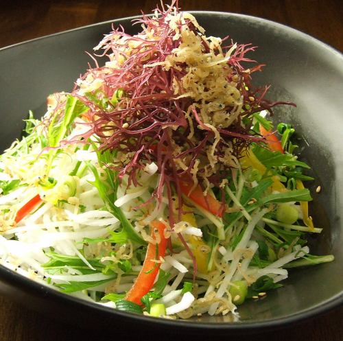 Japanese-style salad with fried sardines and mizuna