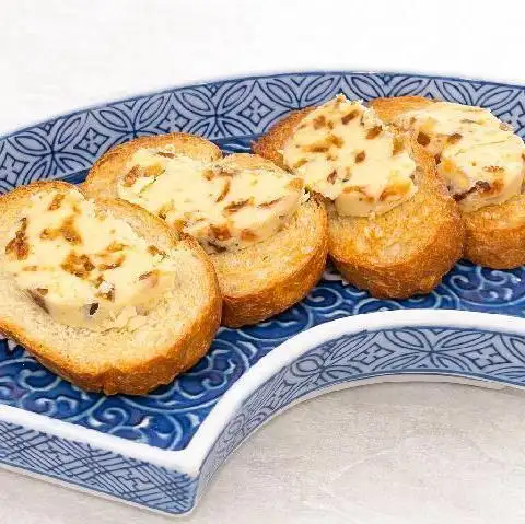 Fig butter - served on toasted baguette slices.