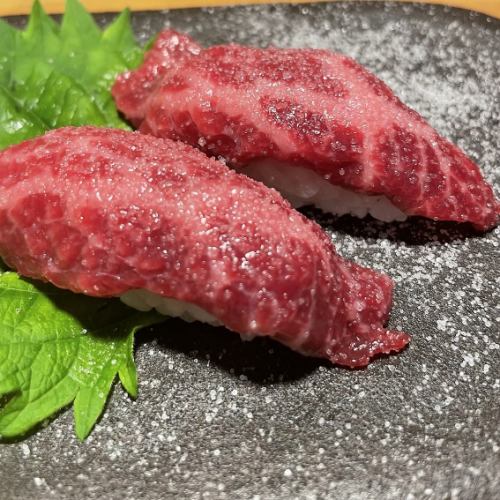The exquisite meat sushi is a must-try dish!